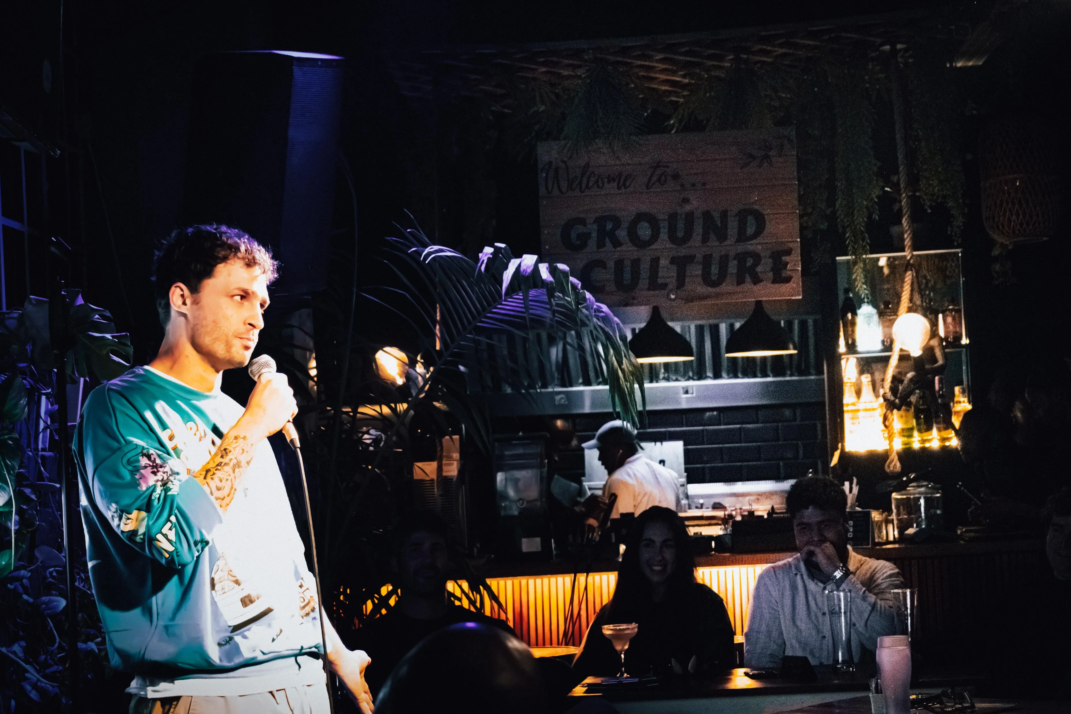 Ruan performing at the Ground Culture Cafe open mic